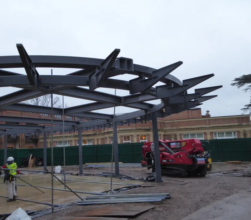 The Grove Hotel Cedar Suite — bespoke radiating steel frame under construction, showing complex curved geometry