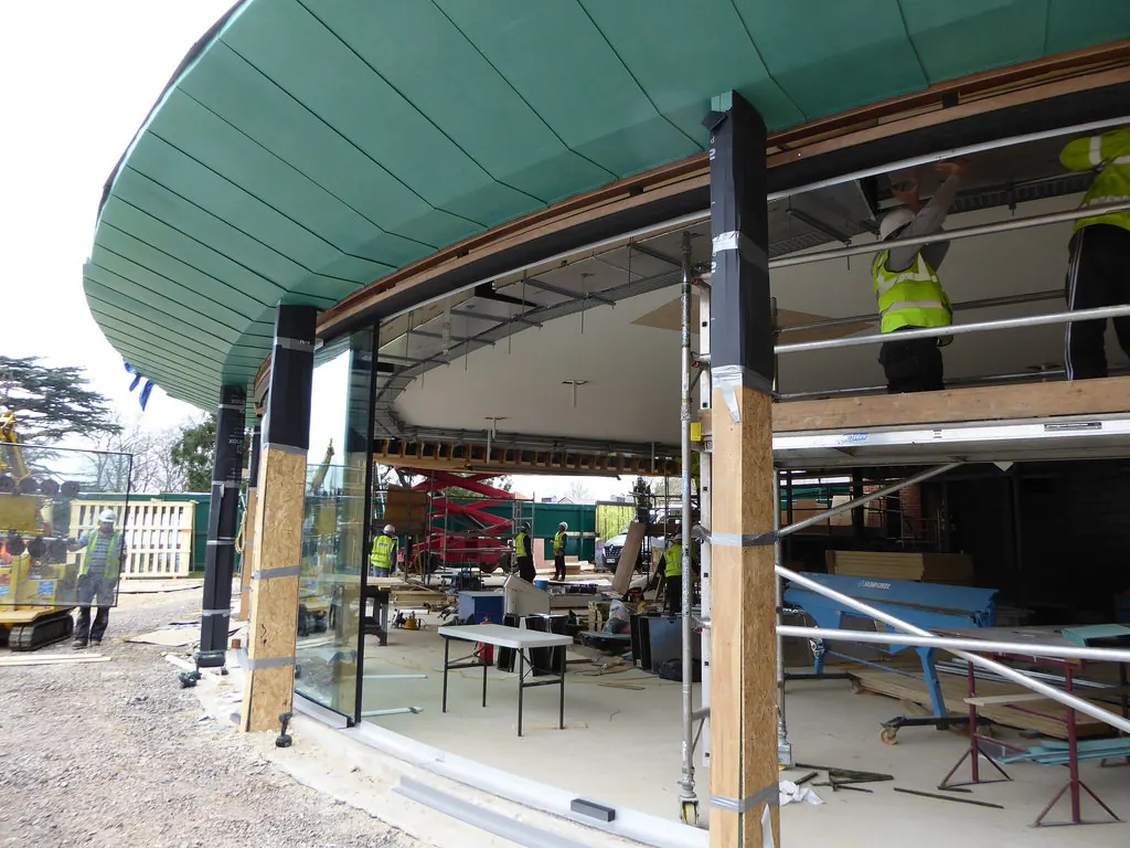 The Grove Hotel Cedar Suite — interior fit-out phase showing curved green ceiling structure