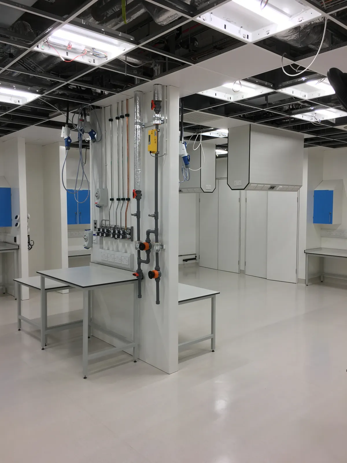 Craig Garbutt — specialist laboratory fit-out: Instron universal testing machine installation in controlled research environment