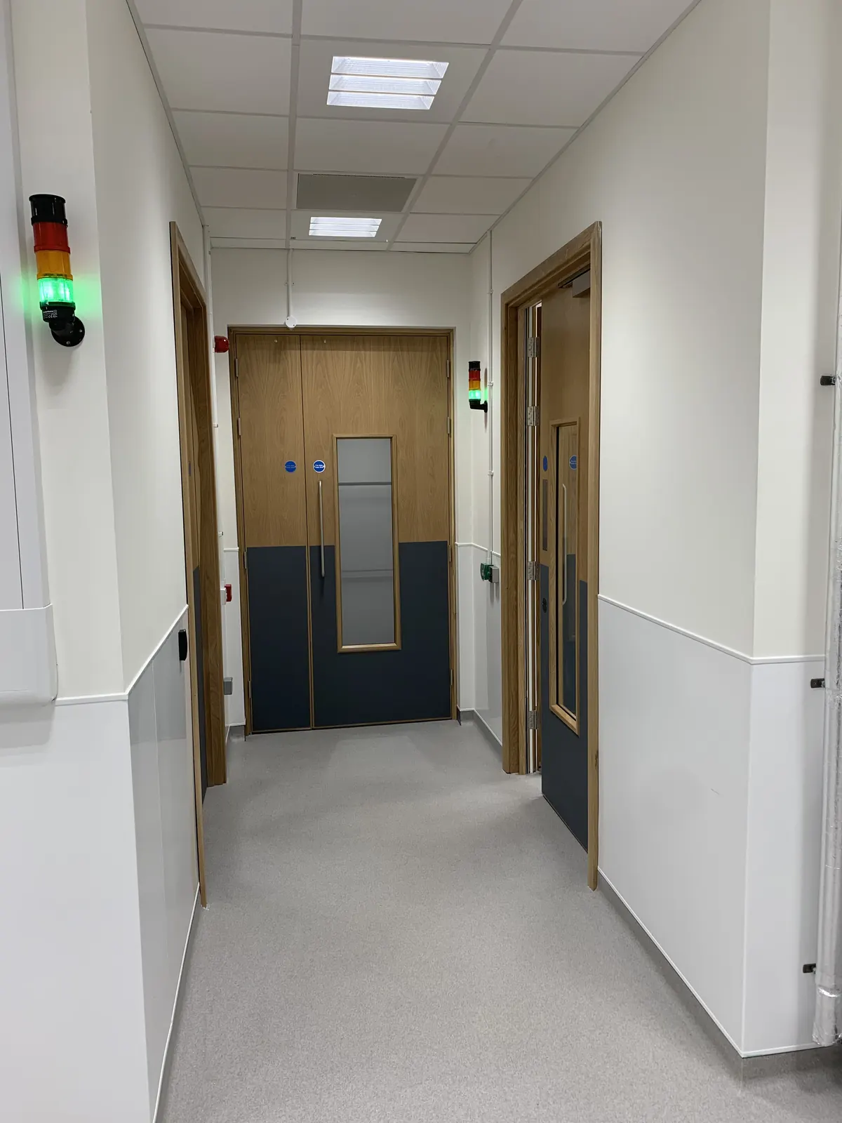 Advanced Materials Testing Facility — secure access corridor serving controlled laboratory environments