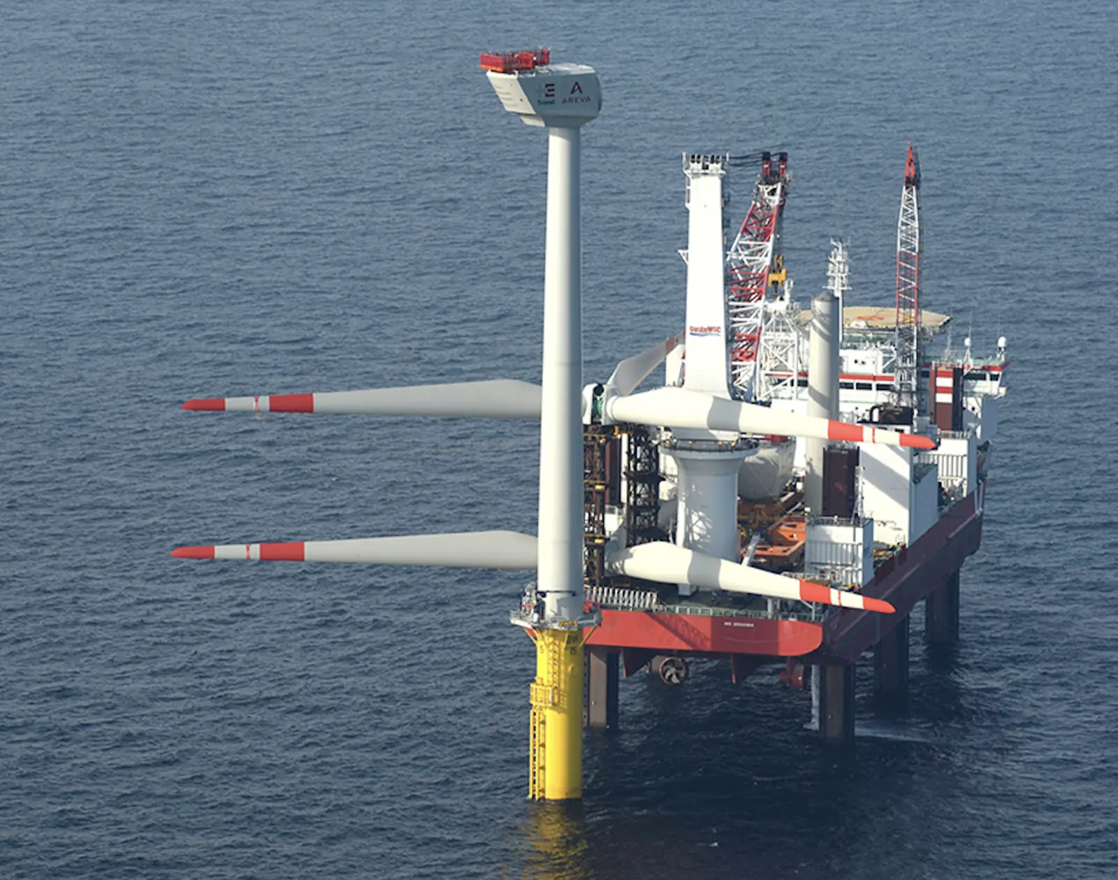 Trianel Windpark Borkum — aerial view of AREVA turbine being installed by jack-up vessel, North Sea