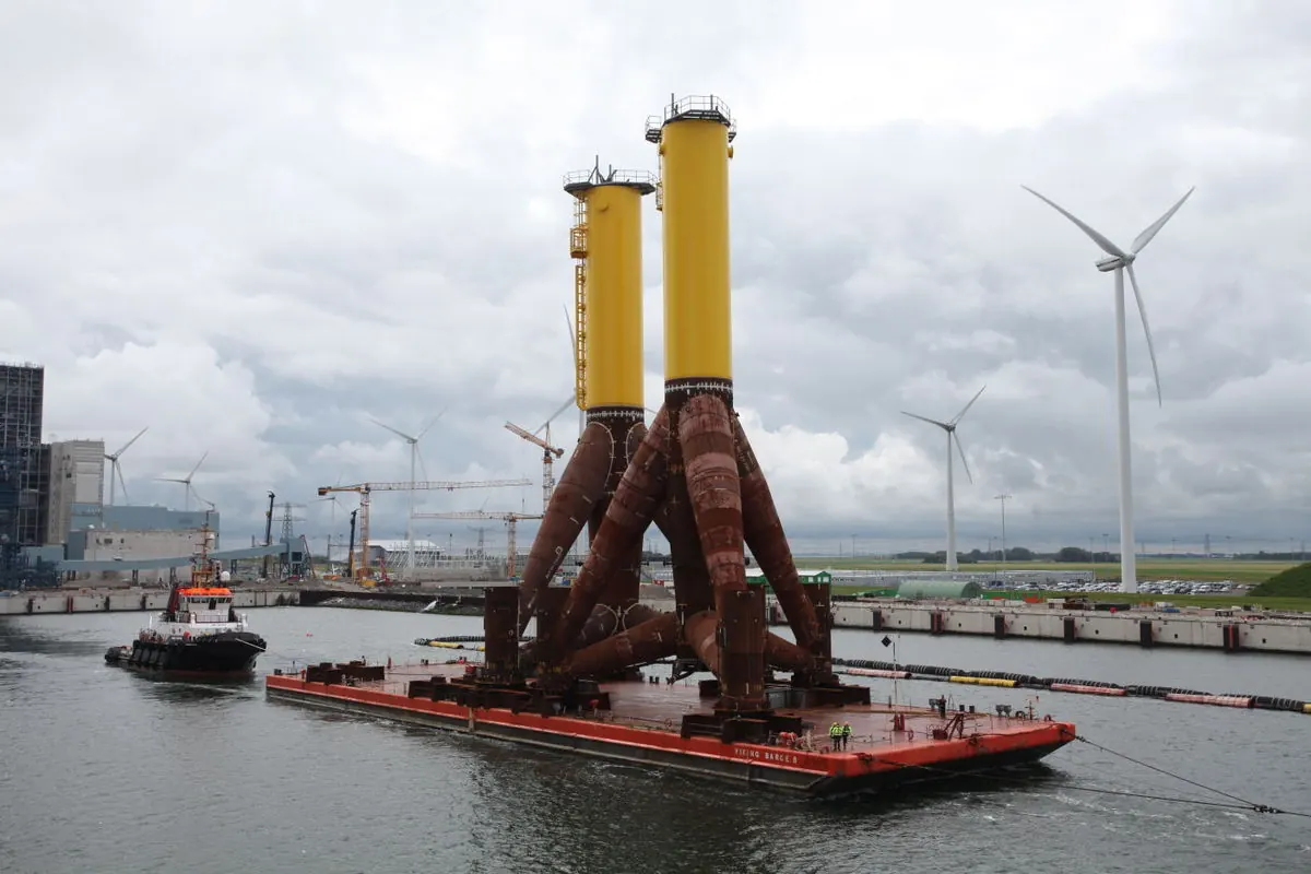 Trianel Windpark Borkum — tripod monopile foundation on heavy-lift barge with tug support at Bremerhaven